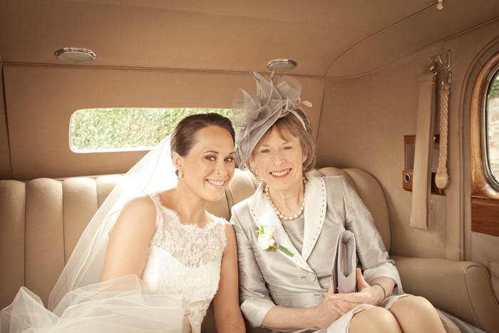 bride and mother of the bride in car